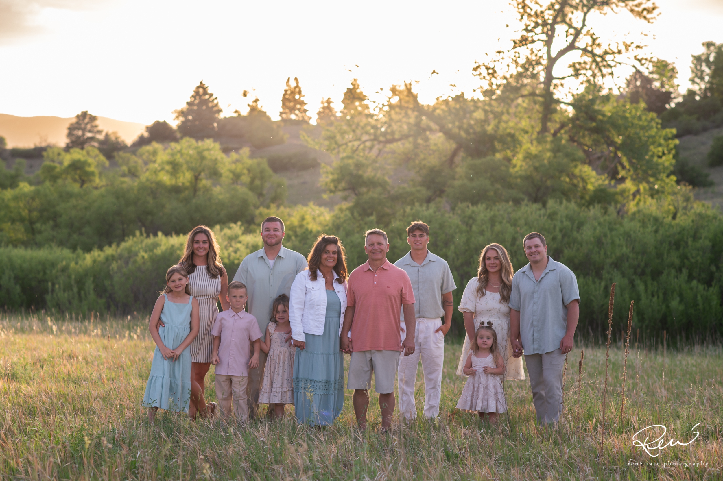 Three generations of family gathered together during an extended family photography session in Colorado Springs.